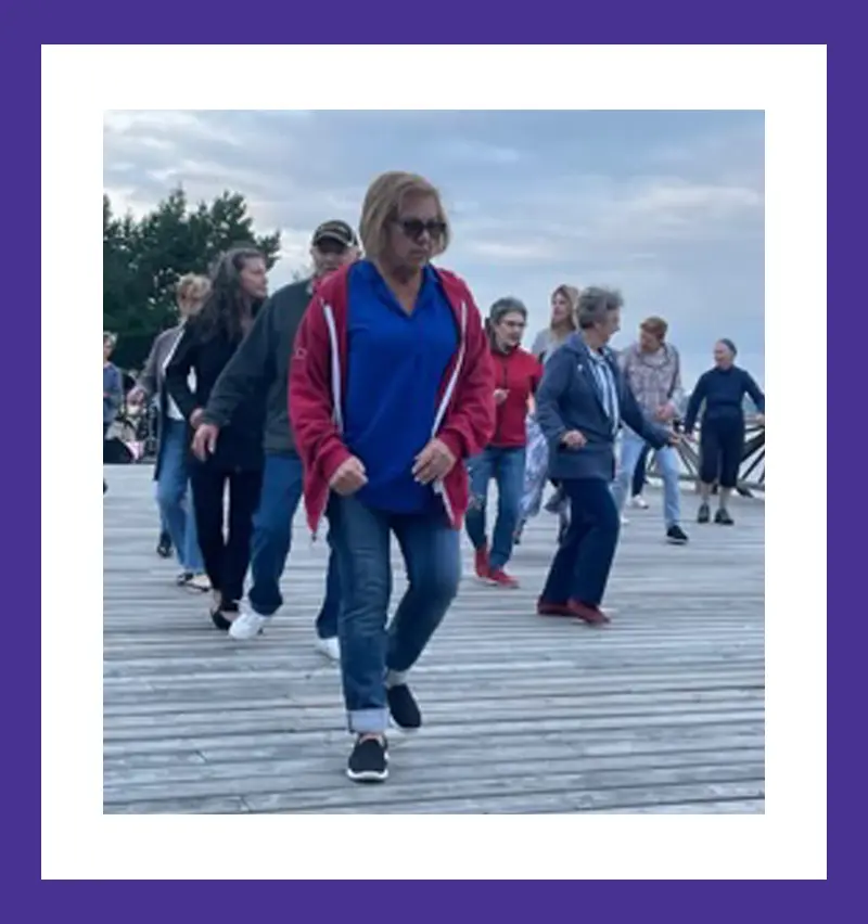 Photo of Nicole with her dancing group