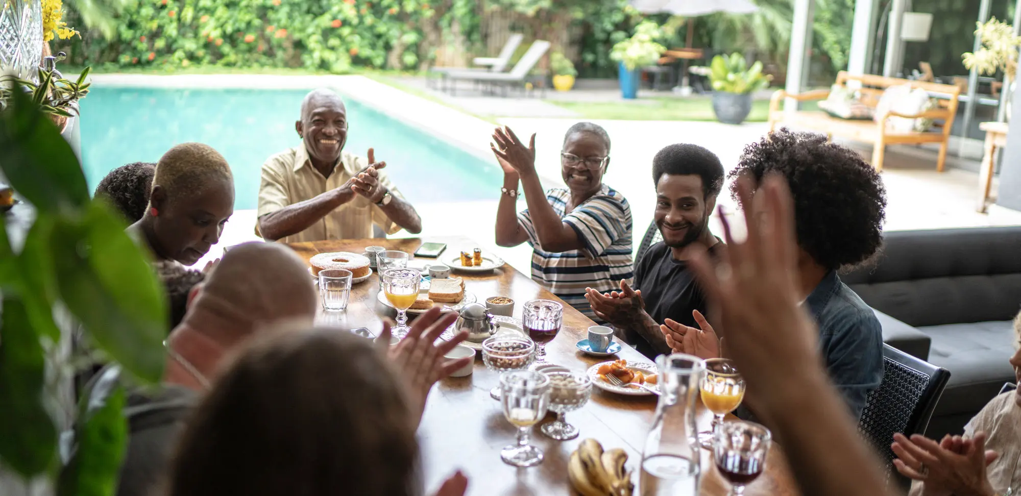Photo of a Multigenerational family enjoying a meal