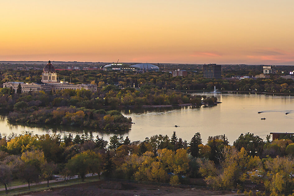 Photo of the Regina skyline and Waskana Lake, in Regina Saskatchewan.